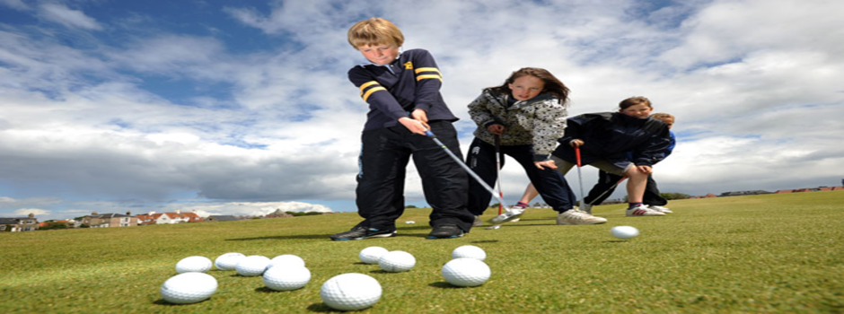Children Putting At Golf Course